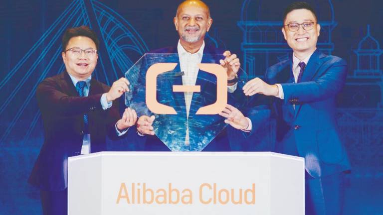 From left: Alibaba Cloud Intelligence International vice-president Bridge Song, Gobind and Kun at the launch.