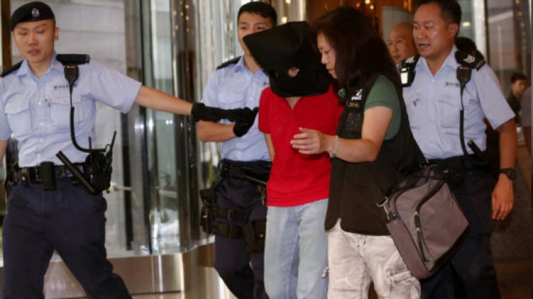 Four wounded in rare Hong Kong shooting