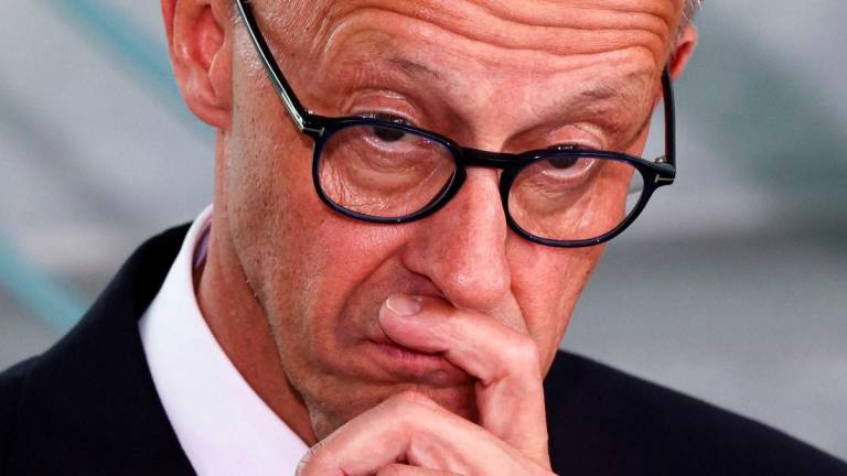 German Chancellor Friedrich Merz looks on as he opens a multilateral youth camp “Youth4Peace” in Berlin, Germany, May 8, 2025. REUTERSpix