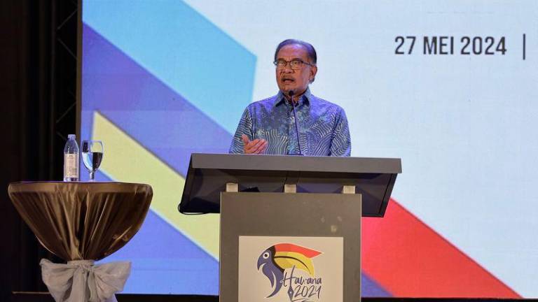Perdana Menteri Datuk Seri Anwar Ibrahim menyampaikan ucapan pada acara kemuncak sambutan Hari Wartawan Nasional (HAWANA) 2024 -fotoBERNAMA