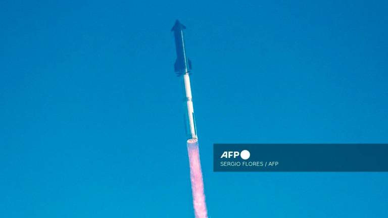 The SpaceX Starship rocket launches from Starbase, Texas, as seen from South Padre Island on May 27, 2025. - AFP