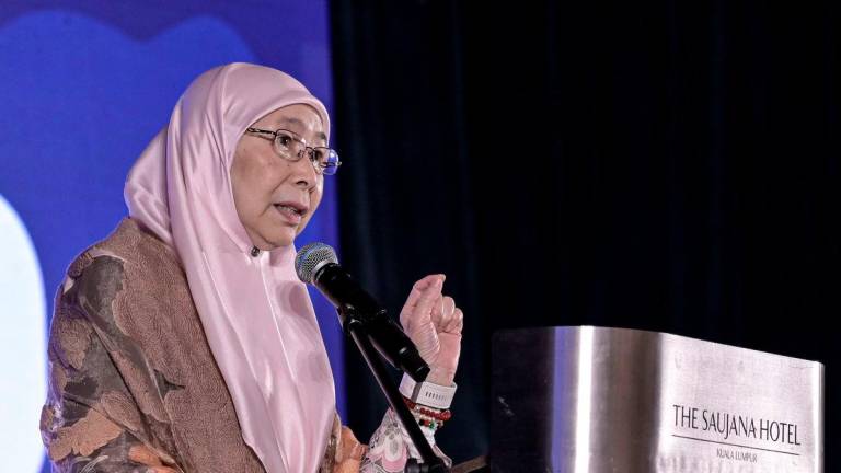 The Prime Minister’s wife, Datuk Seri Dr Wan Azizah Wan Ismail, delivers a speech at the opening ceremony of the Gender Outlook Forum 2025 today. - BERNAMA