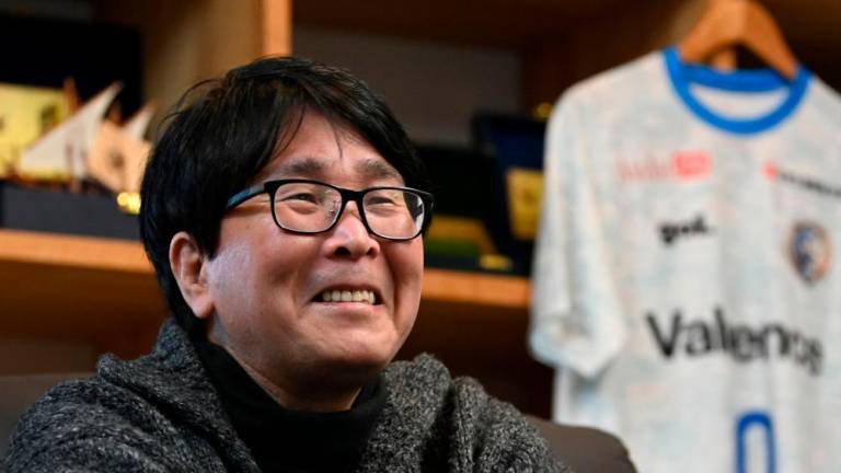 This photo taken on January 30, 2023 shows Japanese cartoonist and manga artist Yoichi Takahashi, best known for his work “Captain Tsubasa”, speaking during an interview with AFP at his workplace in Tokyo/AFPPix