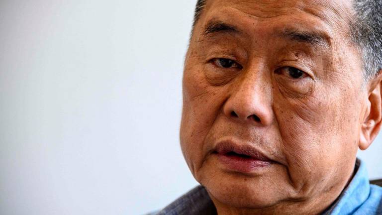 (FILES) Hong kong pro-democracy media mogul Jimmy Lai. - Anthony WALLACE / AFP
