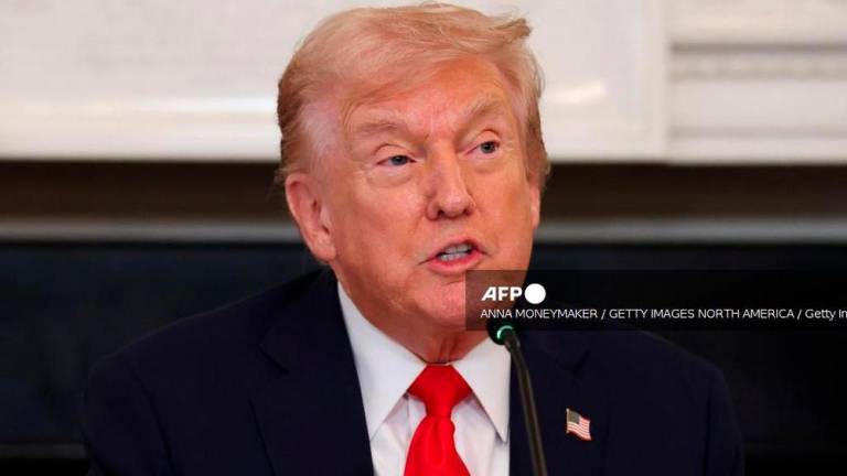 U.S. President Donald Trump delivers remarks during a roundtable discussion in the State Dining Room of the White House on October 08, 2025 in Washington, DC. Anna Moneymaker/Getty Images/AFP (Photo by Anna Moneymaker / GETTY IMAGES NORTH AMERICA / Getty Images via AFP)