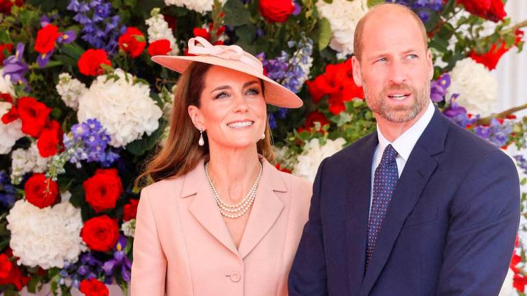 (FILES) Britain’s Catherine, Princess of Wales (L) and Britain’s Prince William, Prince of Wales. - JACOVIDES / POOL / AFP