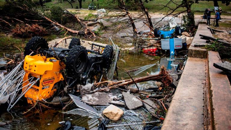Vehicles sit damaged after deadly flooding in Kerrville, Texas, U.S., July 5, 2025. - REUTERS/Sergio Flores