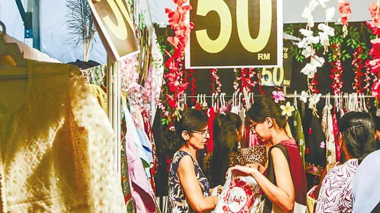 Visitors browsing through jewellery and accessories at the Deepavali Carnival in Bukit Jalil ahead of the festival. – ADAM AMIR HAMZAH/THESUN