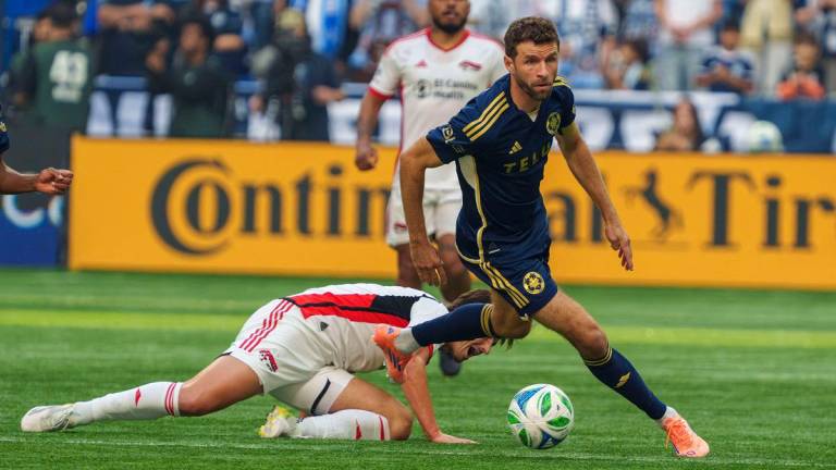 Vancouver Whitecaps FC midfielder Thomas Muller (13) dribbles the ball in the first half against the San Jose Earthquakes in the first half at BC Place. - Christopher Morris-Imagn Images