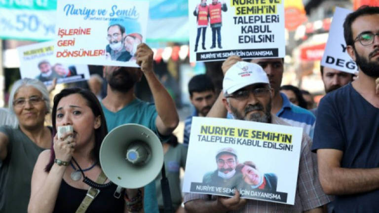 Hunger-striking pair become symbols of Turkey purge