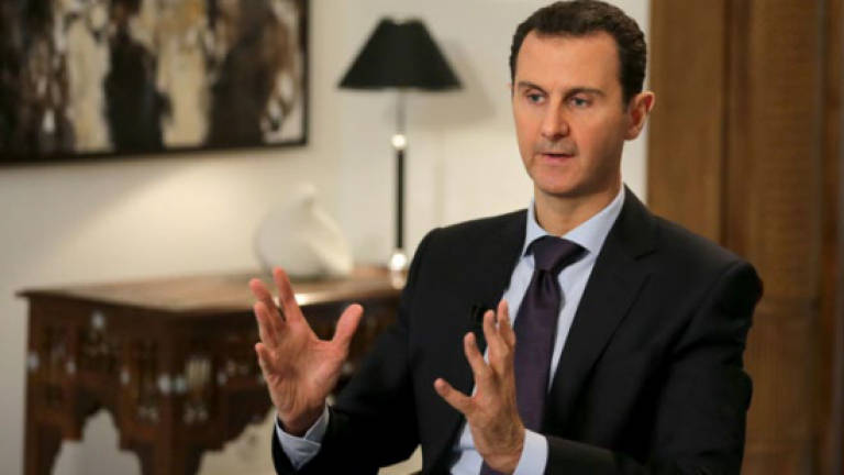 Syria's Assad says Turkey's Erdogan exploiting coup