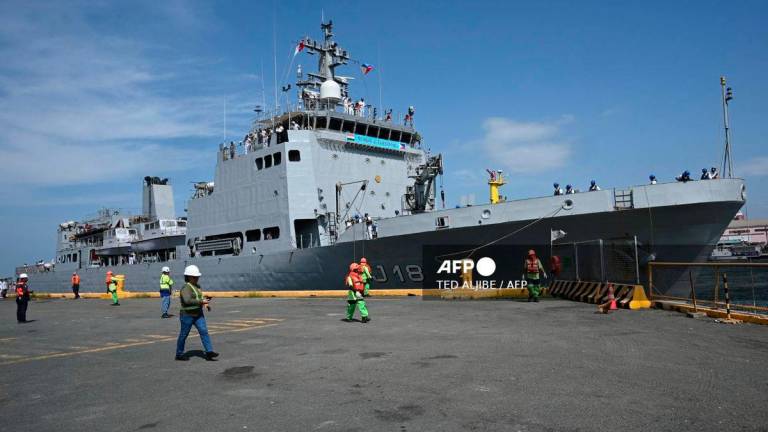 The Indian Navy survey vessel INS Sandhayak docks at the international port of Manila on August 1, 2025. (Photo by Ted ALJIBE / AFP)
