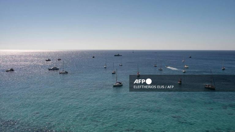 A group of ships of the Global Sumud Flotilla to Gaza are shown moored at the small island of Koufonisi, south of the island of Crete on September 26, 2025. - AFPPIX