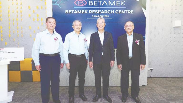 From left: Muhammad Fauzi, Mirzan, Tengku Zafrul and Betamak chairman Ahmad Subri Abdullah at the launch of the R&amp;D centre.