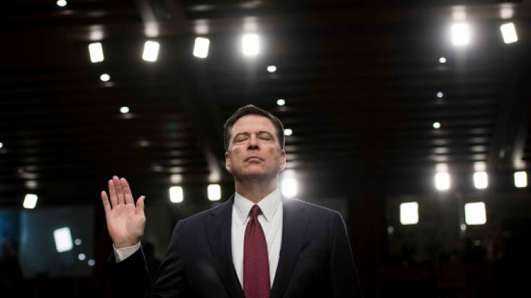 Watchdog faults Comey over Clinton probe, but says no bias