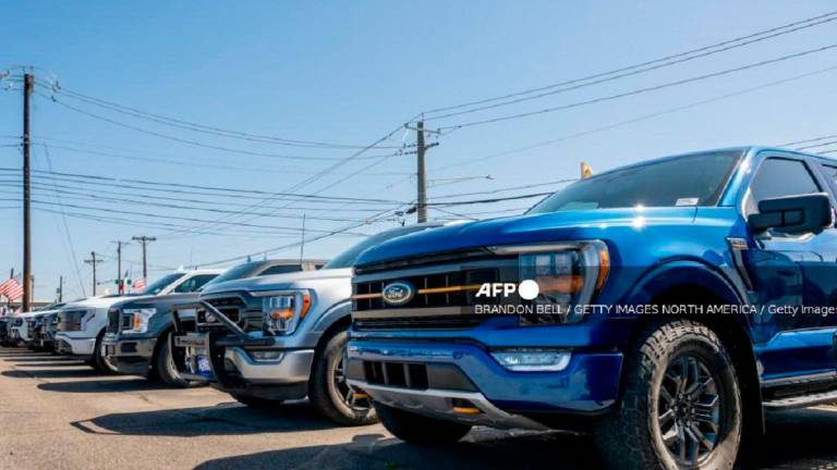 Ford-150 pickup trucks are displayed for sale at a dealership on March 24, 2025 in Austin, Texas. - Brandon Bell/Getty Images/AFP