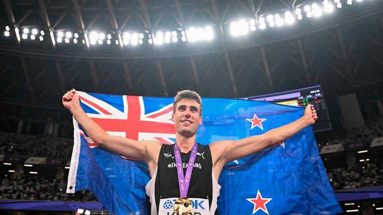 Gold medallist New Zealand’s athlete Hamish Kerr. - Kirill KUDRYAVTSEV / AFP