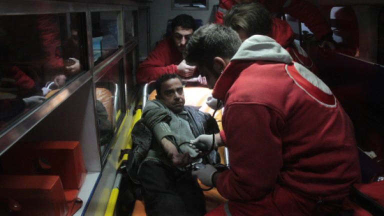 First few patients evacuated from besieged Syria rebel enclave