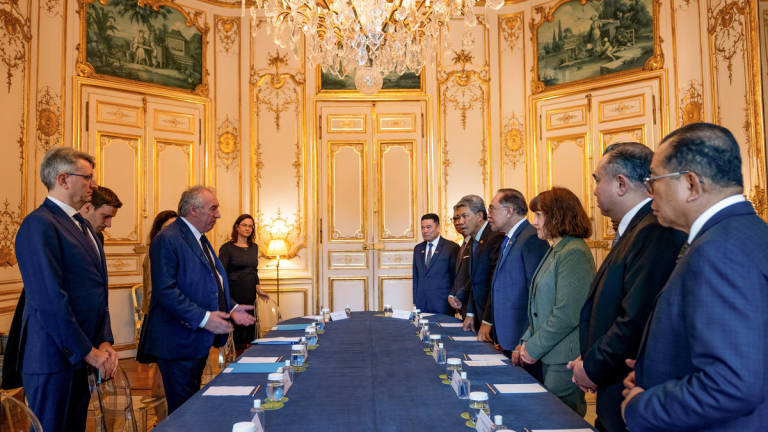 Prime Minister Datuk Seri Anwar Ibrahim (fourth from right) held a meeting with his French counterpart, Francois Bayrou, during Anwar’s visit to France on Thursday. - BERNAMA
