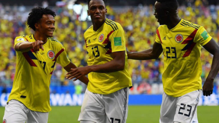 Colombia into knockout stages with 1-0 win over eliminated Senegal