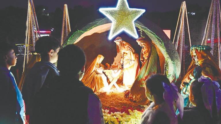 The manger scene denotes humility, simplicity and a more natural lifestyle under the stars, so to speak. Christmas is a reminder to be humble despite wealth, status, ethnic identity or religious standing. – AFPPIC