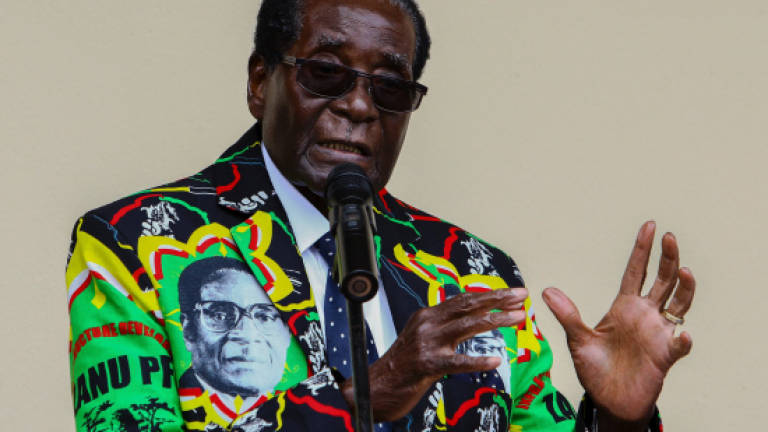 Former Barca stars appear at Mugabe rally