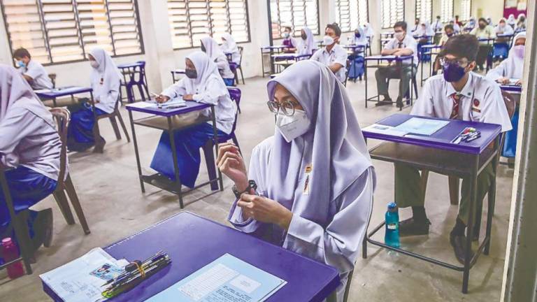 Centralised exams provide standardised metrics across schools, allowing a fair comparison of students’ abilities. – ADIB RAWI YAHYA/THESUN