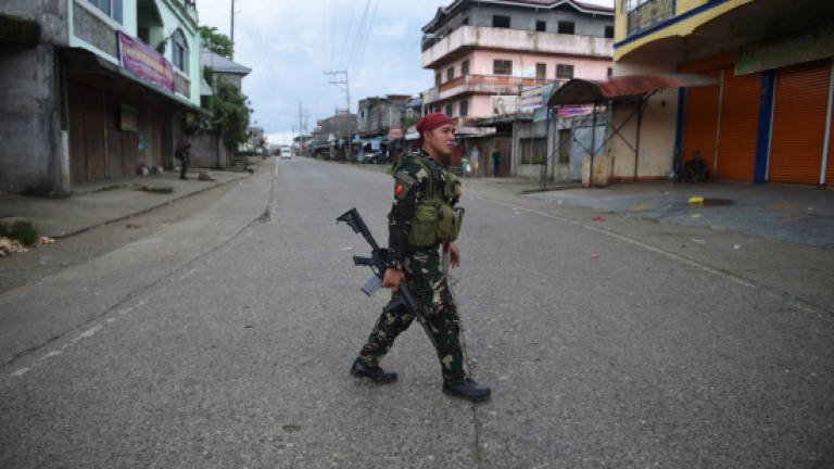 Two Malaysian militants killed in Mindanao battle