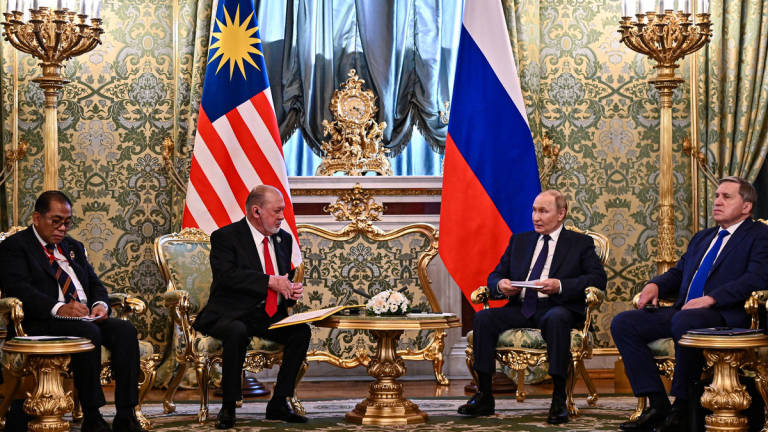 His Majesty Yang di-Pertuan Agong Sultan Ibrahim meeting Russian President Vladimir Putin during the State Welcoming Ceremony at the Grand Kremlin Palace yesterday. - BERNAMA