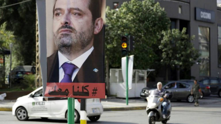 Lebanon's Hariri leaves Riyadh for France