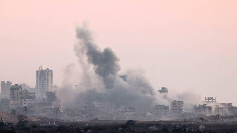Smoke rises from Gaza after an explosion, as seen from the Israeli side of the border, in Israel, September 13, 2025. REUTERS/Amir Cohen