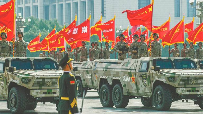 The core geopolitical message that the event sent was about the major advancement in China’s military strength and its ability to contribute to peace and stability in the world. – AFPpix