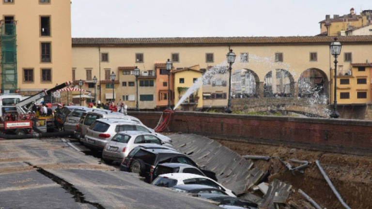 Road collapses near Florence's famed Ponte Vecchio bridge