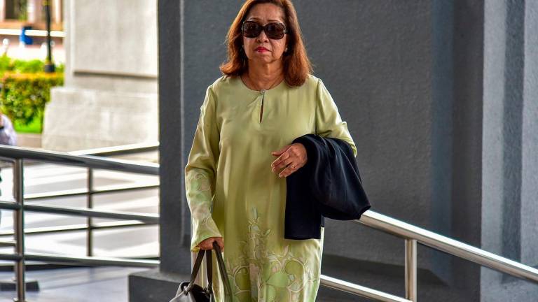 The wife of the late Tun Daim Zainuddin, Toh Puan Na’imah Abdul Khalid. - BERNAMApix