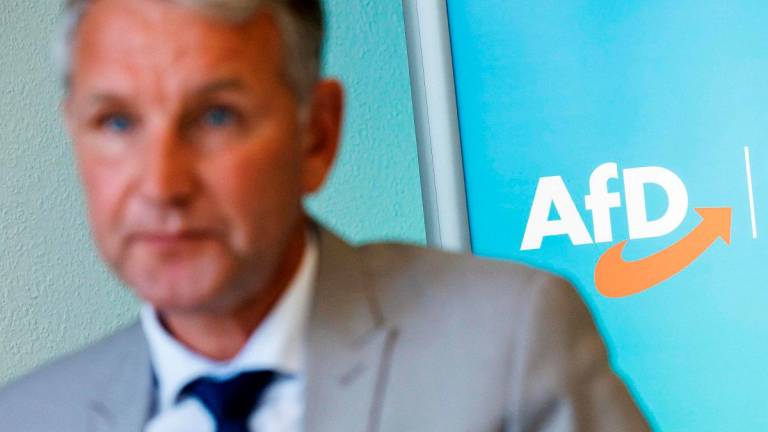 Bjoern Hoecke, regional chairman of the far-right Alternative for Germany (AfD) party in Thuringia and chairman of the AfD faction in the Thuringian state parliament, speaks during an interview with AFP in Erfurt, eastern Germany on September 16, 2025. - JENS SCHLUETER / AFP