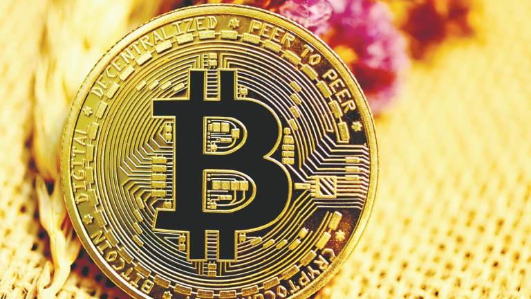 Bitcoin has returned to positive territory this year, though it still lags behind its January peak of over US$109,000. – unsplash pix