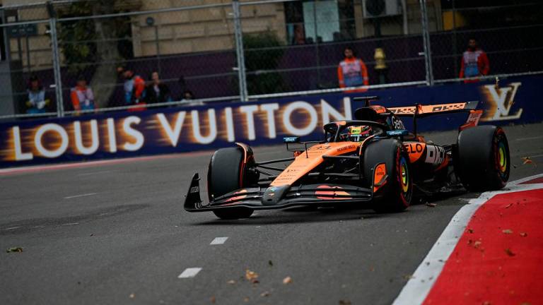 McLaren’s Australian driver Oscar Piastri competes during a qualifying session of the Formula One Azerbaijan Grand Prix at the Baku City Circuit in Baku on September 20, 2025. - Ozan KOSE / AFP