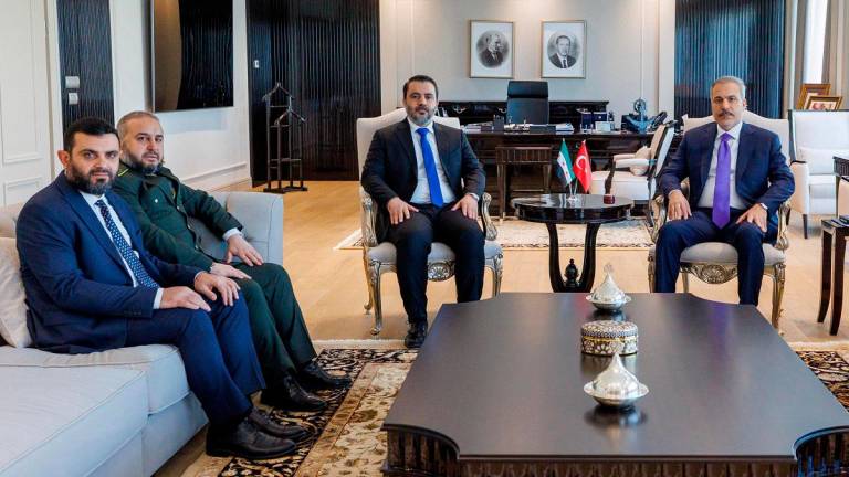Syrian Foreign Minister Asaad Hassan al-Shibani, accompanied by General Intelligence Service Director Hussein Al-Salama and Defence Minister Murhaf Abu Qasra, meets with his Turkish counterpart Hakan Fidan in Ankara, Turkey, August 13, 2025. - Turkish Foreign Ministry/Handout via REUTERS