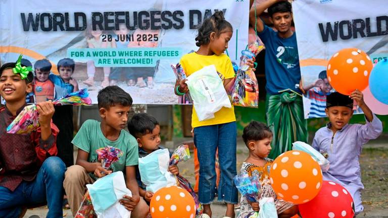 Refugees in Malaysia are not formally recognised under domestic law, leaving them vulnerable to exploitation, arbitrary arrest and detention. – AFPpix