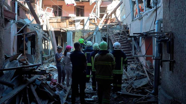 Ukrainian rescuers inspect the site of a drone attack in the port city of Odesa on June 17, 2025, amid the Russian invasion in Ukraine. Ukraine on June 17 slammed the lack of an “adequate reaction” from the world to Russia’s deadly strikes on its soil, after an attack on the capital Kyiv killed at least 14 people. - Oleksandr GIMANOV / AFP