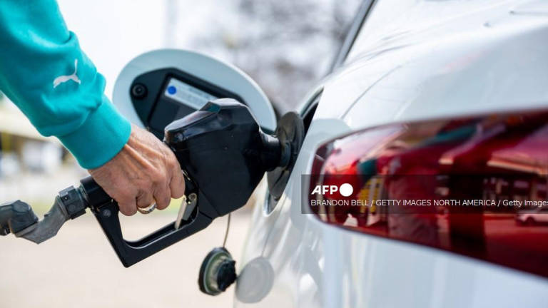 A customer pumps gas at a Shell gas station on February 13, 2025 in Austin, Texas. - Getty Images via AFP