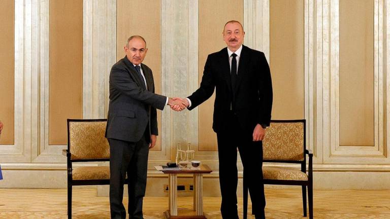 Armenian Prime Minister Nikol Pashinyan and Azerbaijani President Ilham Aliyev meet in Abu Dhabi, United Arab Emirates July 10, 2025. Press Service of Prime Minister of the Republic of Armenia/Handout via REUTERS