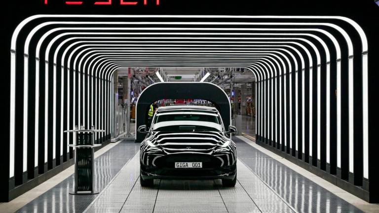 Model Y cars are pictured during the opening ceremony of the new Tesla Gigafactory for electric cars in Gruenheide, Germany, March 22, 2022. - REUTERSPIX