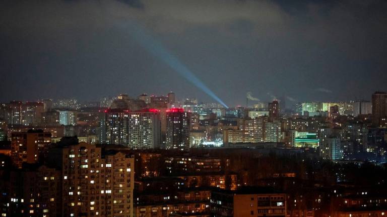 Ukrainian service personnel use a searchlight as they search for drones in the sky over the city during a Russian drone strike, amid Russia's attack on Ukraine, in Kyiv, Ukraine February 6, 2025. - REUTERSPIX