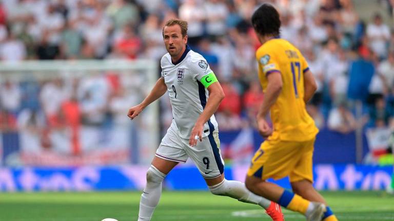 England’s forward Harry Kane is challenged by Andorra’s midfielder #17 Joan Cervos during the 2026 World Cup qualifiers Europe zone - AFPpix