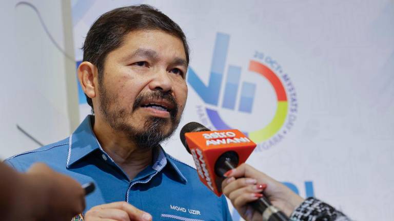 Chief Statistician Datuk Seri Dr Mohd Uzir Mahidin - Photo by BERNAMA