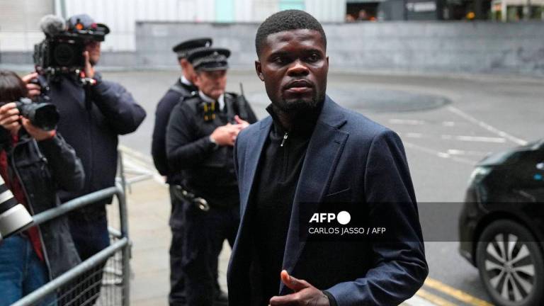 Ghanaian footballer Thomas Partey arrives at Southwark Crown Court in London on September 17, 2025. (Photo by CARLOS JASSO / AFP)