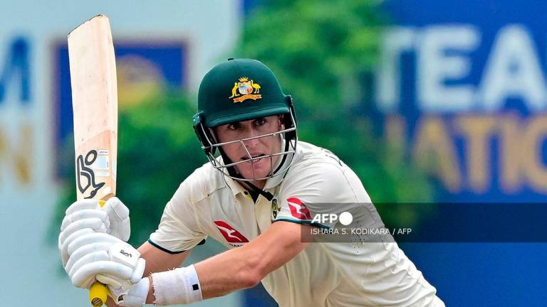 Australia’s Marnus Labuschagne plays a shot during the first day of the first Test cricket match between Sri Lanka and Australia at the Galle International Cricket Stadium in Galle on January 29, 2025. (Photo by Ishara S. KODIKARA / AFP)