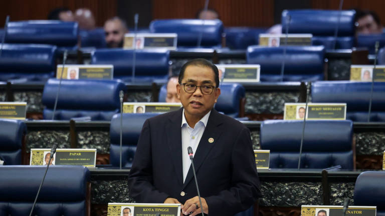 Defence Minister Datuk Seri Mohamed Khaled Nordin at the Parliament today. - BERNAMA