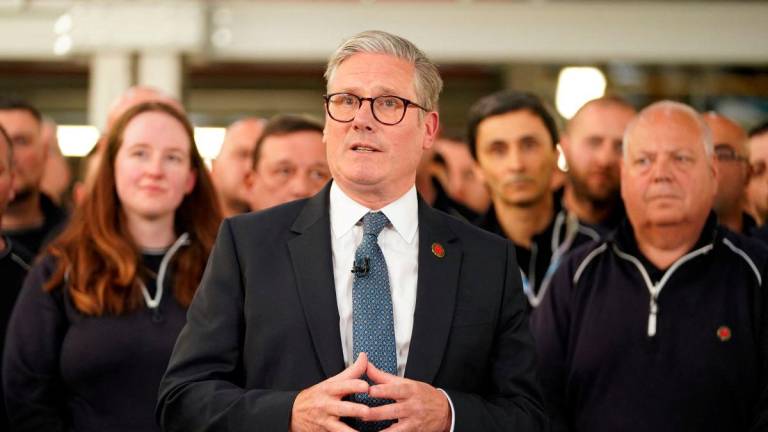 Britain?s Prime Minister Keir Starmer speaks to employees at a car factory in the West Midlands, Britain, Thursday, May 8, 2025.REUTERSpix